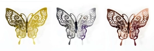 Detailed view of hollow lace butterfly wall stickers in gold, purple, and bronze finishes