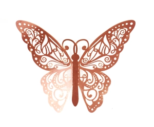 Close-up of rose gold hollow butterfly wall sticker with intricate laser-cut patterns
