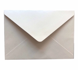 Detailed view of the V-shaped flap closure on a premium cream matte paper envelope