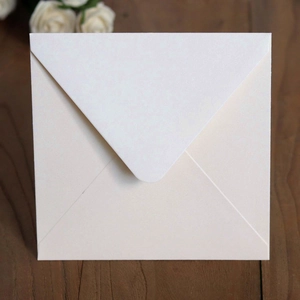 Elegant cream square pearlescent paper envelope for invitations and wedding greeting cards