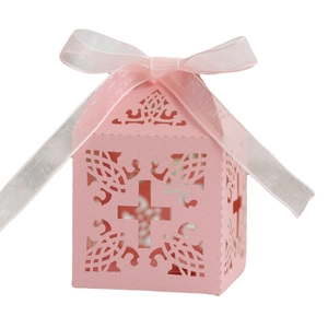 Pink laser-cut gift box with hollow cross design and decorative silk ribbon bow