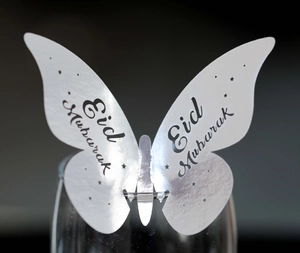 Silver Eid Mubarak butterfly glass card featuring pearl paper and star pattern