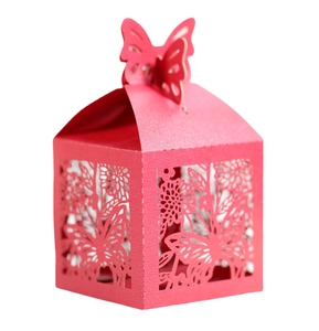 Pink laser cut wedding favor box with butterfly decor and elegant hollow floral patterns