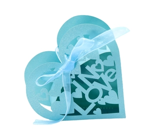 Light blue heart-shaped hollow favor box with LOVE laser cut design and satin ribbon