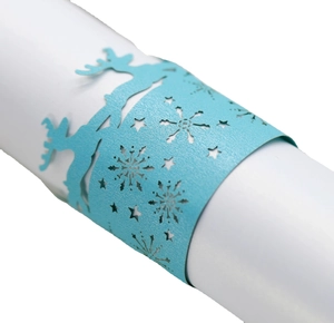 Sky blue laser-cut paper napkin ring featuring reindeer and snowflake holiday patterns