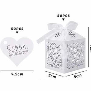 50pcs white laser-cut wedding favor boxes with heart patterns and ribbons, size 5x5x7cm