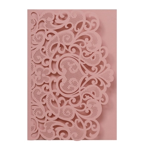 Pink laser-cut wedding invitation card with intricate hollow floral and heart patterns