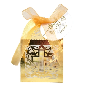 Elegant gold laser-cut candy box with cross pattern, thank you tag, and ribbon