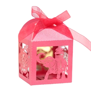 Pink laser-cut elephant candy box with a glitter finish and matching silk ribbon bow
