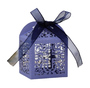 Elegant laser cut lavender paper wedding favor box with cross pattern and blue organza ribbon