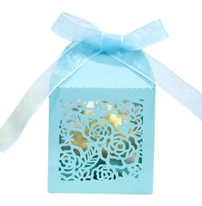 Light blue laser cut hollow rose candy gift box with elegant blue ribbon bow
