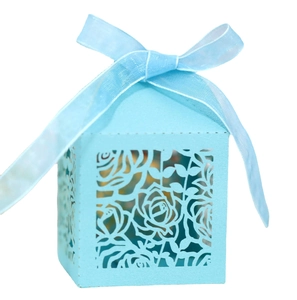 Elegant light blue laser-cut rose wedding favor box with a matching decorative ribbon