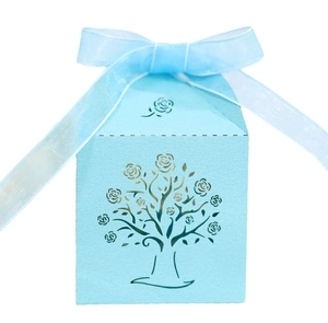 Light blue hollowed-out tree design candy gift box with a sheer organza ribbon bow