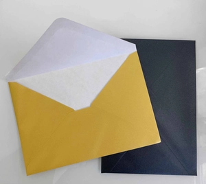 Classic gold and navy blue textured envelopes with gummed seals for wedding invitations