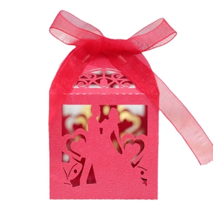 Laser cut red wedding favor box with romantic couple silhouette and organza ribbon bow