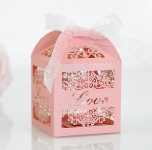 Pink laser-cut hollow LOVE candy box with white organza ribbon for wedding gift favors