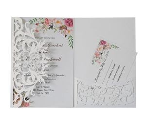 Elegant laser-cut floral wedding invitation set with pearl paper and printed RSVP card