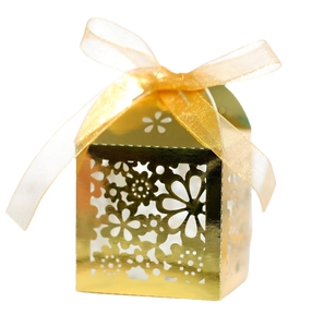 Elegant gold hollow flower candy box with organza bow for wedding favors and parties