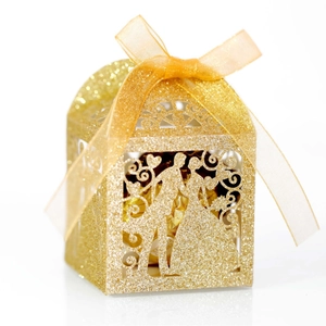 Elegant gold glitter laser cut wedding favor box with silhouette design and gold ribbon