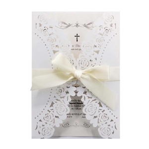 Elegant laser cut rose hollow wedding invitation card with a cream ribbon bow