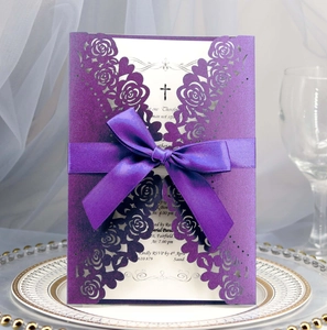 Elegant laser cut purple floral invitation card with silk ribbon bow for celebrations