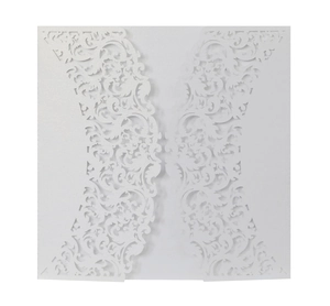 Detail of laser-cut pearl white invitation cover with intricate floral lace pattern