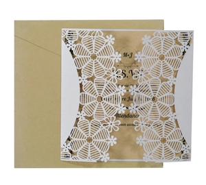 Laser cut floral wedding invitation set with translucent insert and kraft envelope