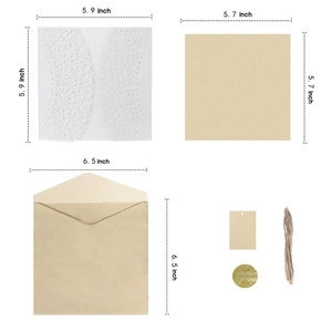 Laser cut white wedding invitation set with kraft paper inserts and gold wax seal
