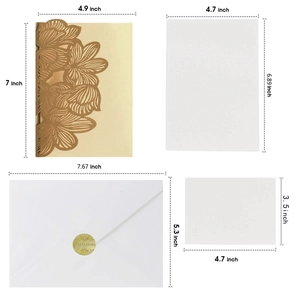 Golden laser-cut lace wedding invitation set with envelopes and inner cards