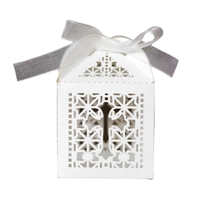 White laser cut cross gift box with silver ribbon for candy and favors packaging