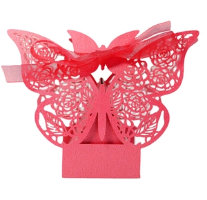 Elegant red laser-cut butterfly candy box with hollow rose patterns and silk ribbon