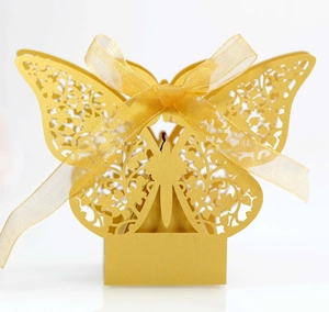 Elegant gold butterfly laser cut gift box with floral pattern and golden organza ribbon