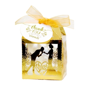 Elegant gold hollow laser cut wedding candy box with couple silhouette and silk ribbon