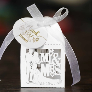 Laser cut Mr & Mrs white wedding favor box with ribbon and gold thank you tag