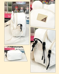 Detail shots of white canvas bear bag showing zippers, fabric label and ears