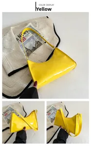 Vue détaillée d'un sac baguette hobo en cuir verni jaune vif avec une finition brillante