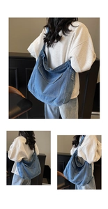 Détail du sac cabas en jean bleu montrant les bords usés et la grande poche frontale