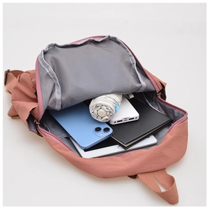 Detail view of the spacious inner compartment showing grey lining and pocket organization