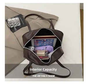 Interior view of vintage coffee leather tote bag showing large capacity for iPad and umbrella