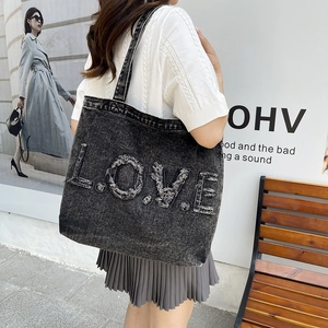 Retro washed denim tote bag with oversized LOVE letter embroidery and wide shoulder strap