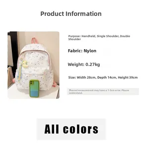 Detailed size specifications of white star print nylon backpack with moon pendant charm