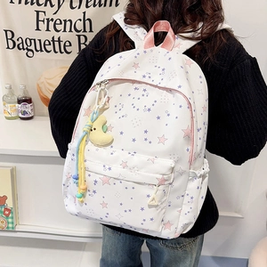 Chic white backpack with colorful star prints and a plush moon pendant for school girls