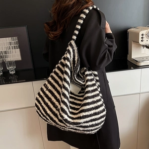 Chic black and white striped plush crescent bag with Seeyou label for casual daily commute