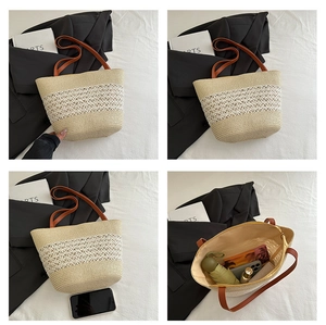 Vue détaillée du sac cabas en paille avec motifs de fleurs au crochet et lanières en cuir