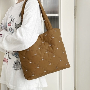 Brown quilted nylon tote bag with white bow embroidery and large capacity for daily commute