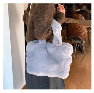 Faux fur tote bag in lavender featuring a plush long hair texture for autumn winter fashion