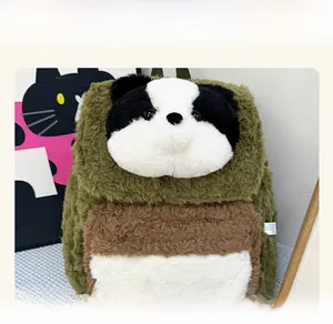 Detail view of the soft plush panda backpack with green faux fur and zipper pockets