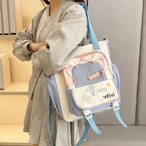 Multicolor patchwork canvas tote bag with Happy Days embroidery for casual school wear