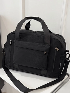Large capacity black travel duffel bag with multi-layer zipper and adjustable shoulder strap