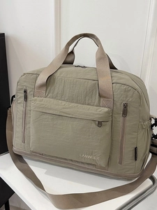 Large capacity sage green fitness travel bag with adjustable shoulder strap and pockets